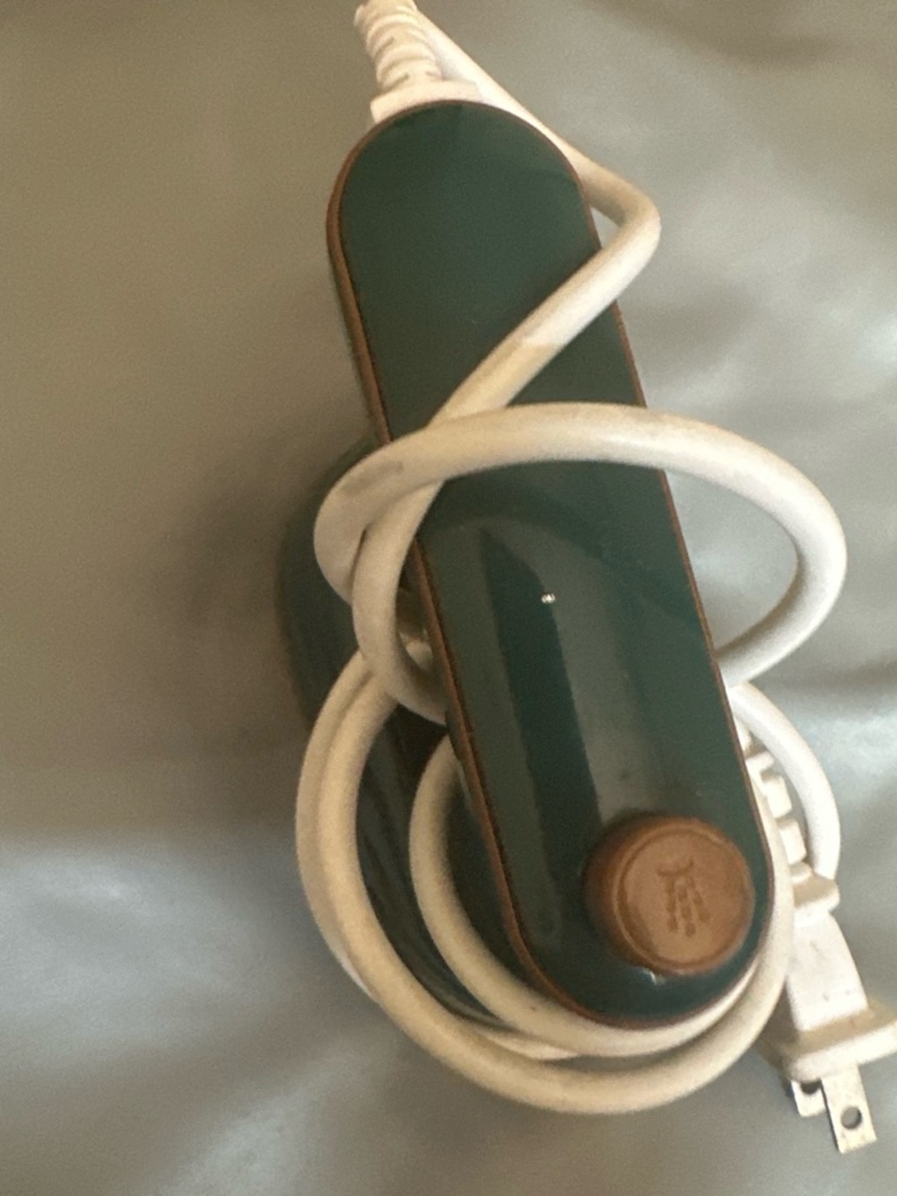 Green Handheld Hair Straightener with White Cord